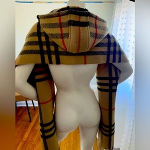 Never worn Burberry scarf/hood.